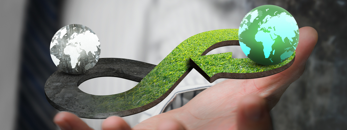 Mono-material Textiles in Circular Design A hand holding an infinity-loop symbol with two globes representing circular design and mono-material sustainability